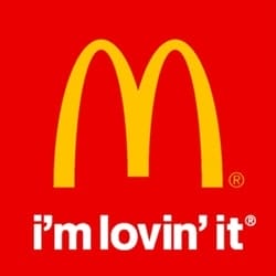 The McDonald's logo features large yellow arches forming an "M" on a red background, with the slogan "i'm lovin' it" written in white lowercase letters below.