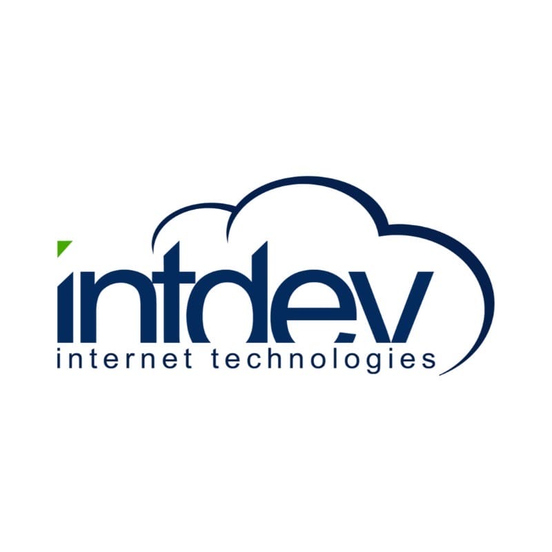 Logo with the word “intdev” in lowercase blue letters, partially enclosed by a blue cloud outline. Designed for corporate voice clients, a small green triangle accents the "i." Below, the text “internet technologies” appears in smaller blue lowercase letters. White background.