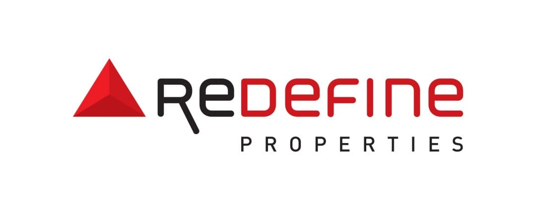 Logo with a red triangular shape on the left and the words "ReDefine" in black and red stylized font; "PROPERTIES" in black, spaced capitals below. Designed for corporate voice clients, this logo stands out on a white background for a modern, professional appeal.